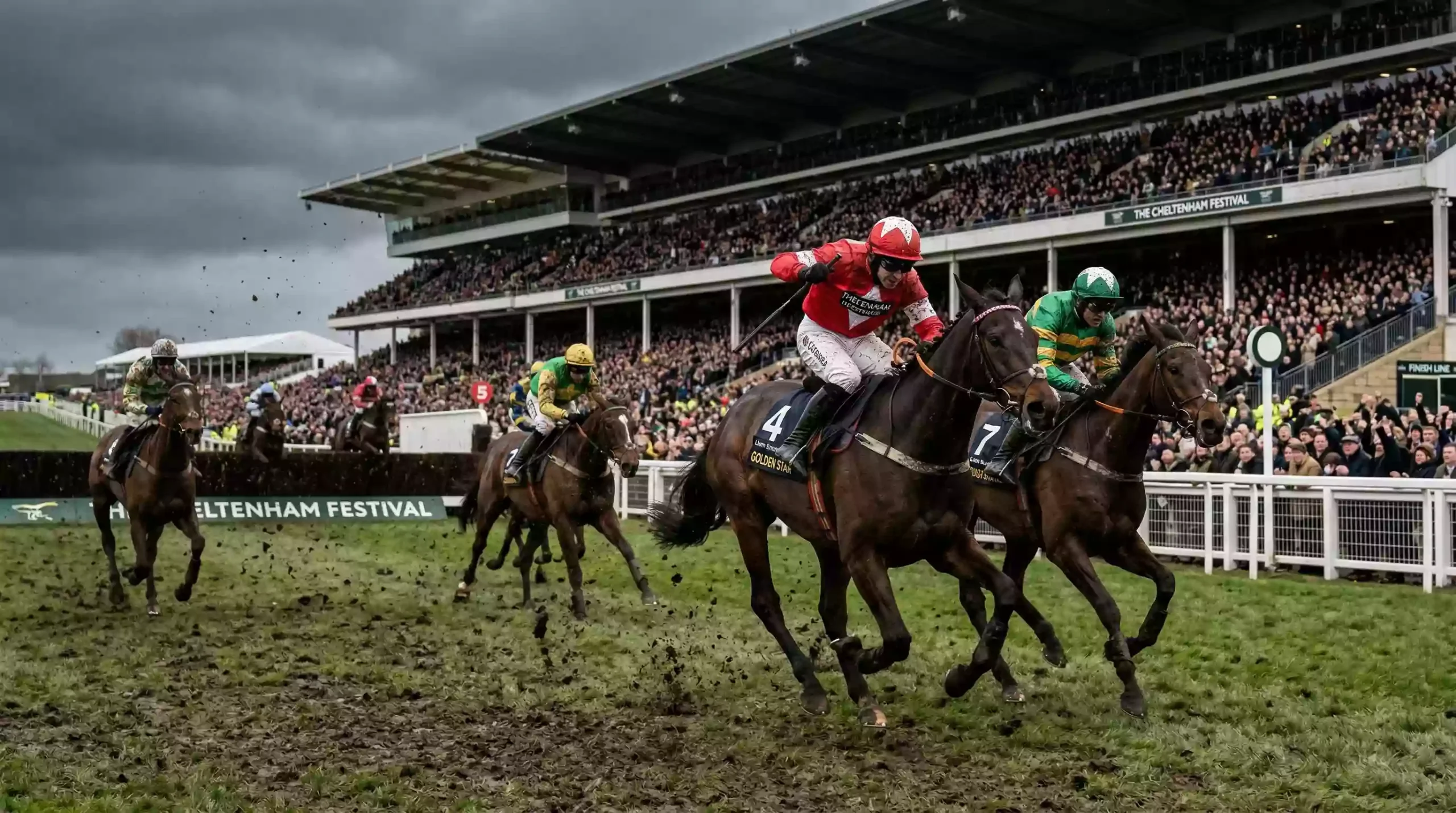 Horses racing uphill towards the finish at Cheltenham Racecourse during the Festival